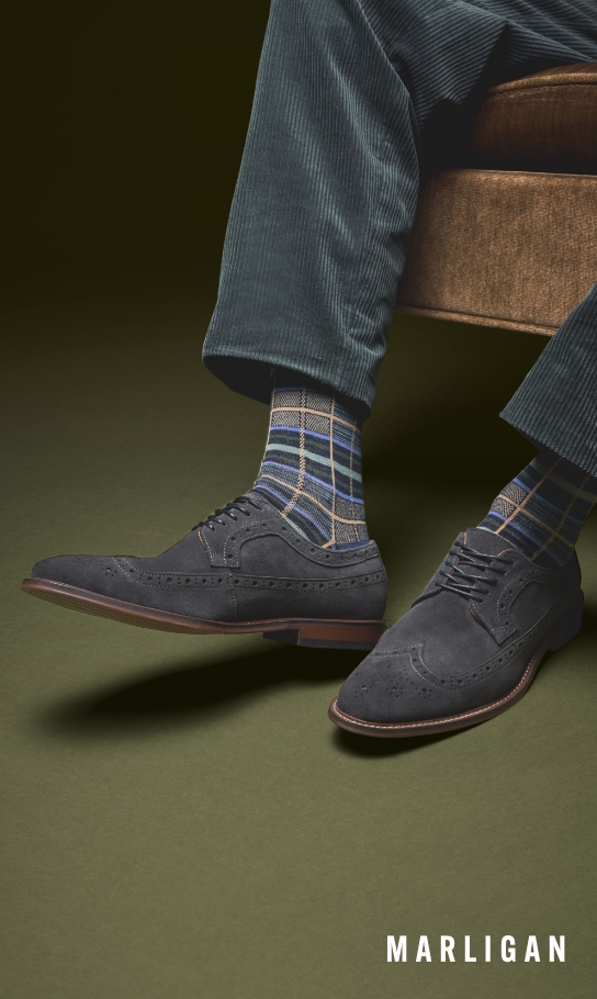 Shoes for Men view all category. Image features the Marligan wingtip in grey suede.