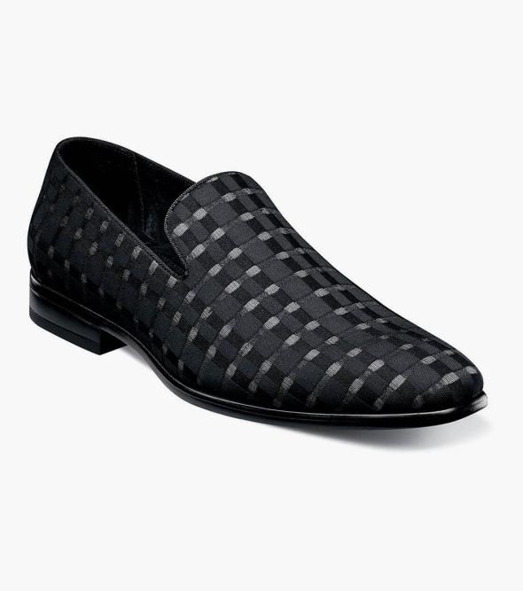Talk about a bit of flash; this checkered slip on seems to change its appearance with the angle of the light. Featuring a textured upper and dress sole; the Stacy Adams Stiles Checkered Slip On is dazzling from every angle. For added comfort it also has a fully cushioned Memory Foam insole. see Stiles