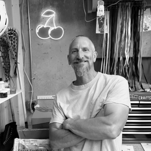 A black and white portrait image of customizer artist Keven Ringgold.