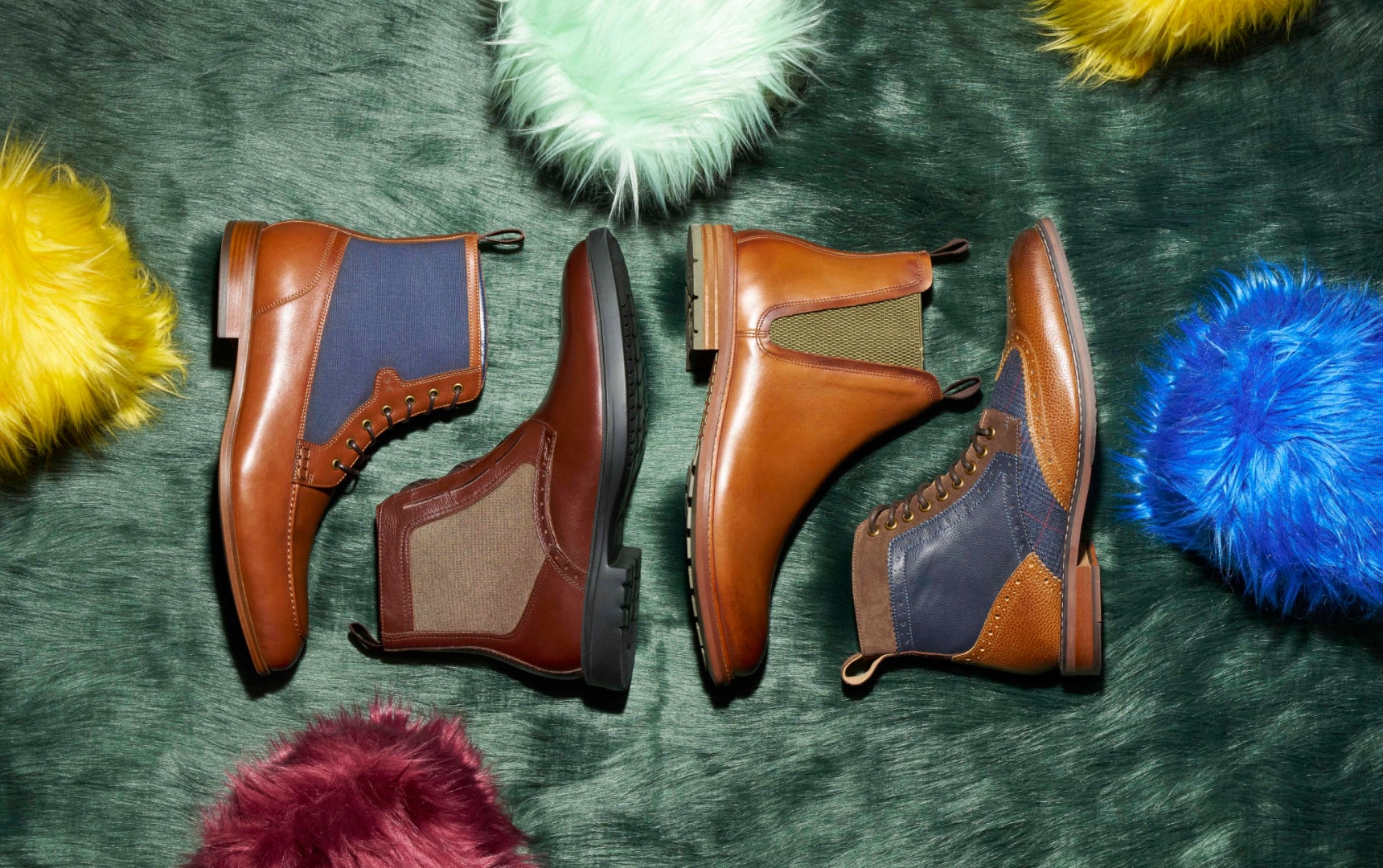 Shop Stacy Adams boots featuring a variety of styles on a green fur background.