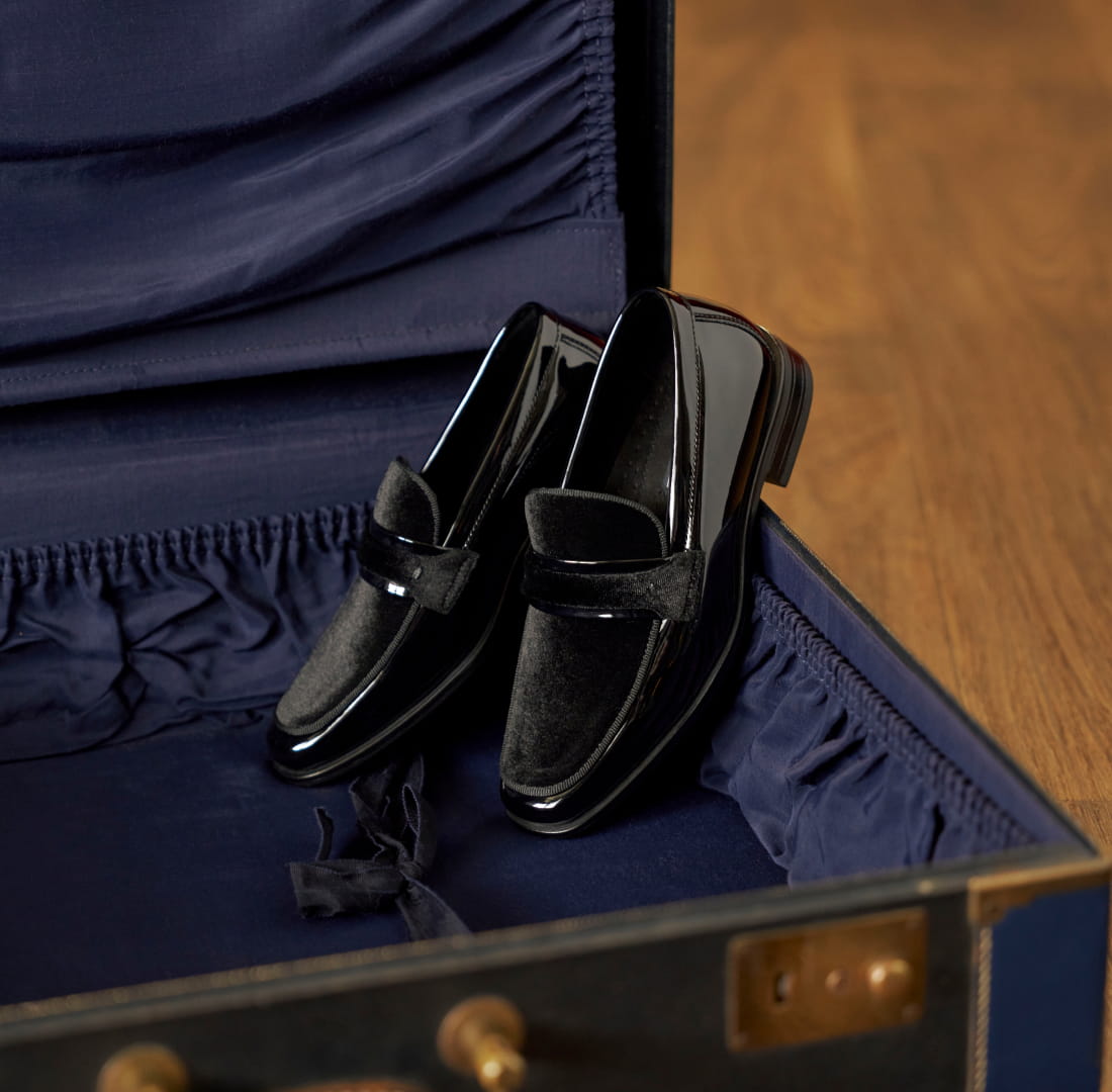 Shop Stacy Adams kids featuring the Spratley inside a vintage suitcase.