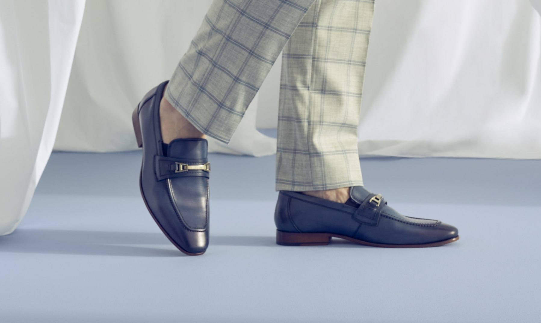 Click to shop Stacy Adams dress shoes. Image features the Glendon in navy. 