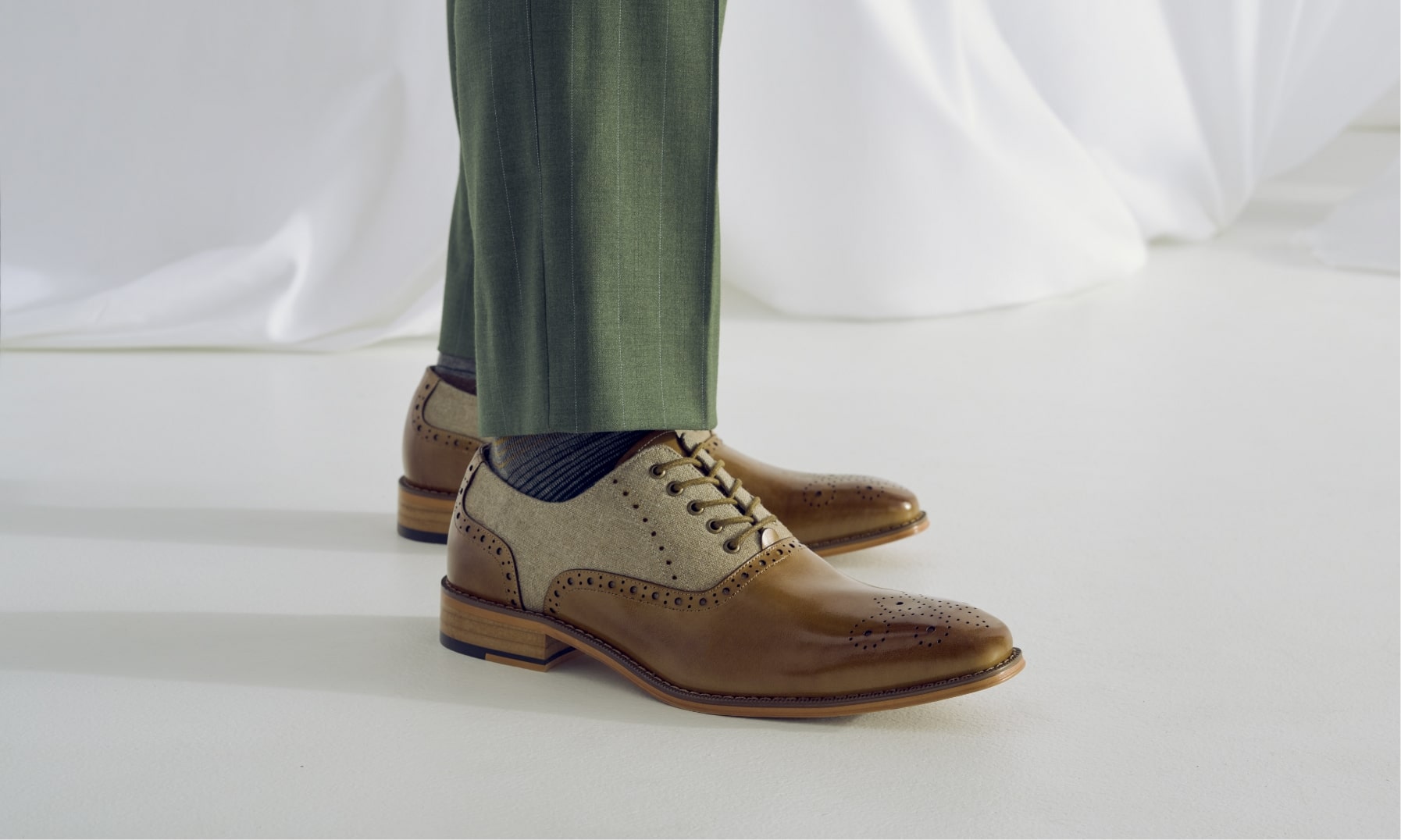 Click to shop Stacy Adams dress shoes. Image features the Harrington in cognac multi.