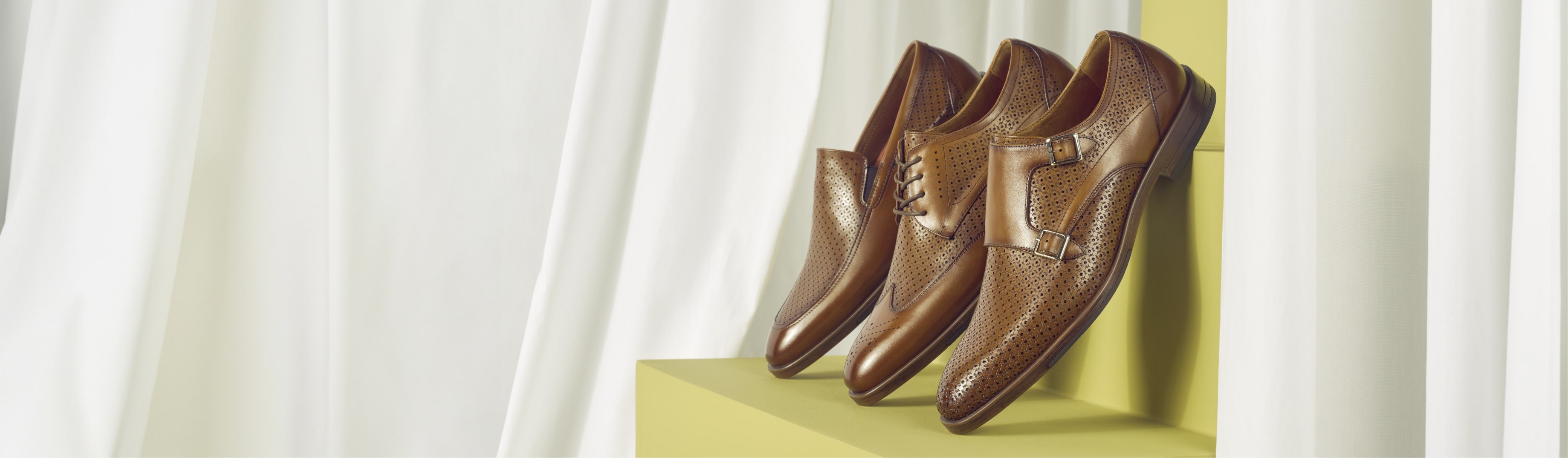Click to shop the Stacy Adams A series. Image features a variety of dress shoes. 