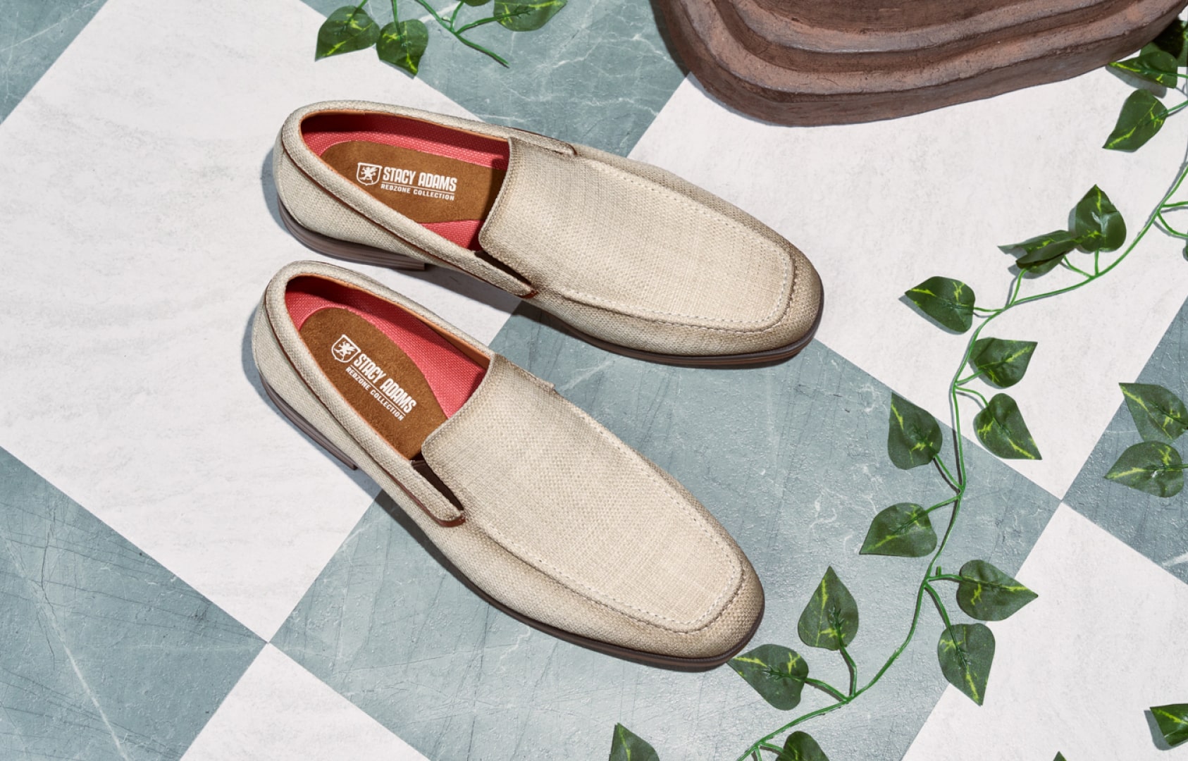 Shop Stacy Adams loafers. Image features the Ridgely loafer in natural on a blue and white checkered floor.