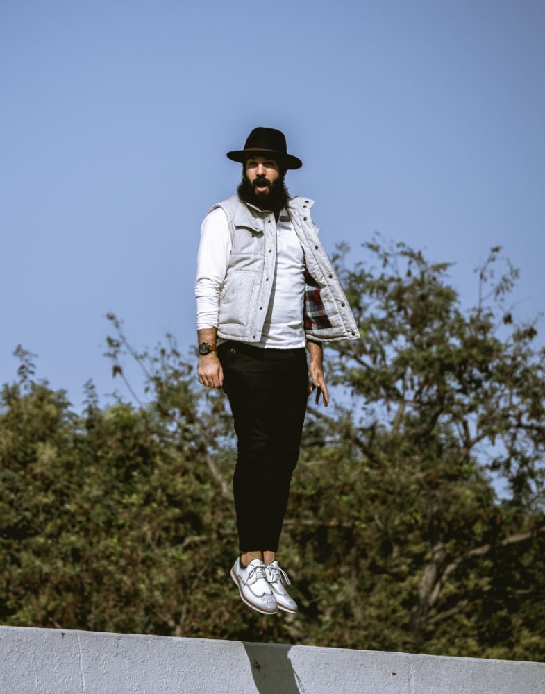 Image of social media influencer Anthony Mastracci jumping in the Synergy Wingtip Oxford in Ice.