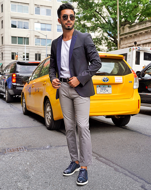 Image of social media influencer Mark Bay wearing the Hawkins Cap Toe Lace Up in Indigo in NYC.