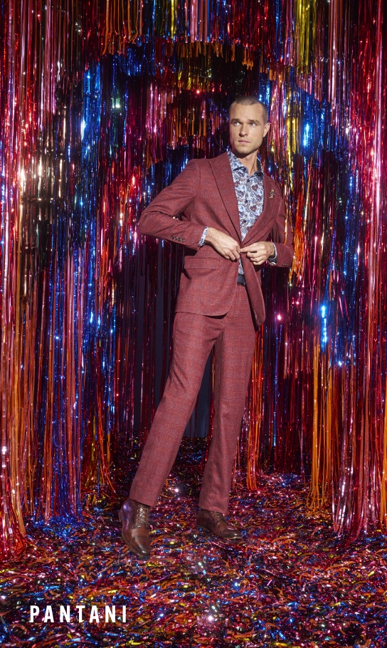 Men's Suits category. Image features the Pantani suit in front of a colorful tinsel background.