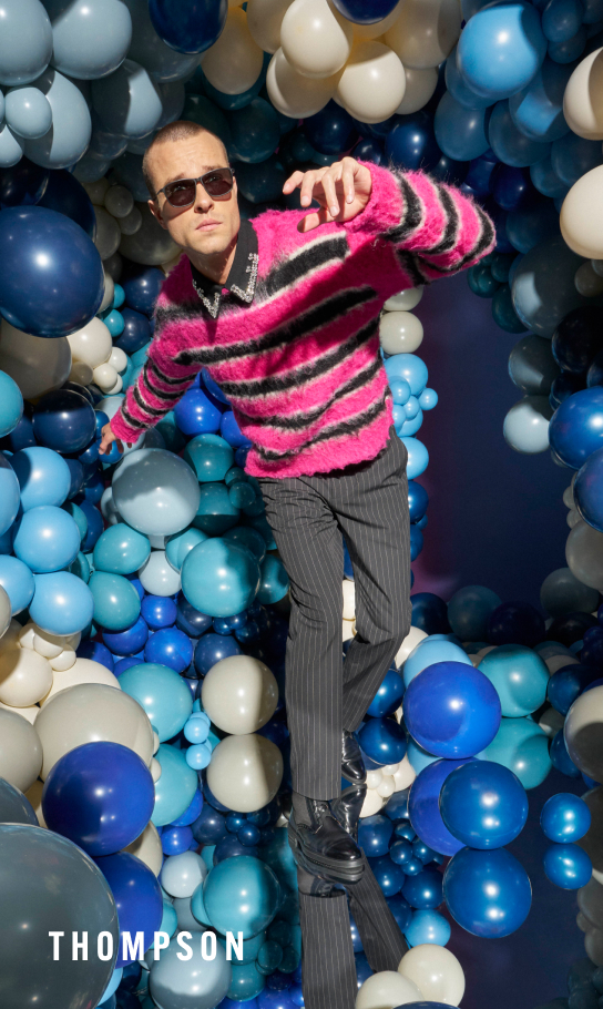 Shoes for Men view all category. Image features the Thompson boot in black. 