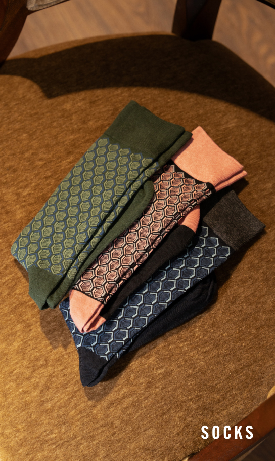 Men's Socks category. Image features a hexagon patterened sock in multiple colors.