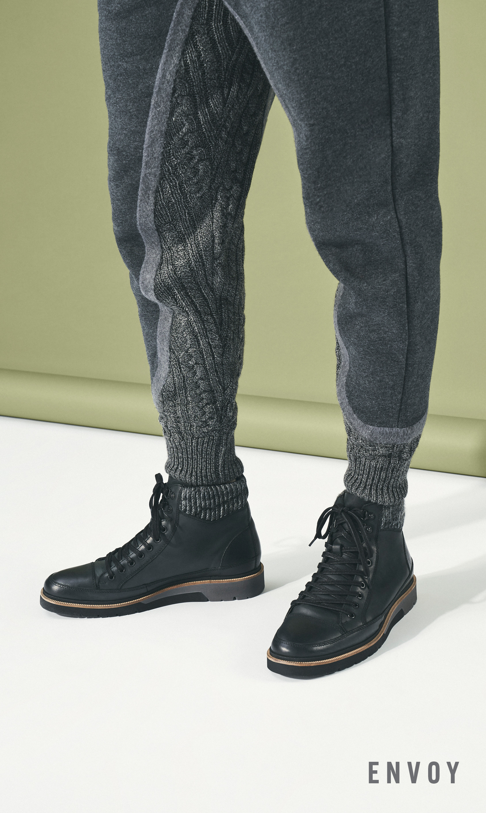 Men's Boots category. Image features the Envoy boot in black.