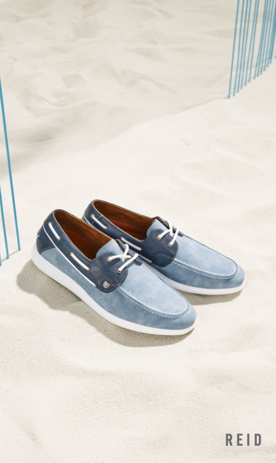Men's Loafers & Slip Ons category. Image features the Reid in light blue.