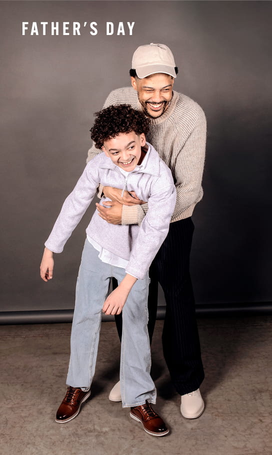 Father's Day Picks Image features a knee down shot of a man and his son in Stacy Adams sneakers.