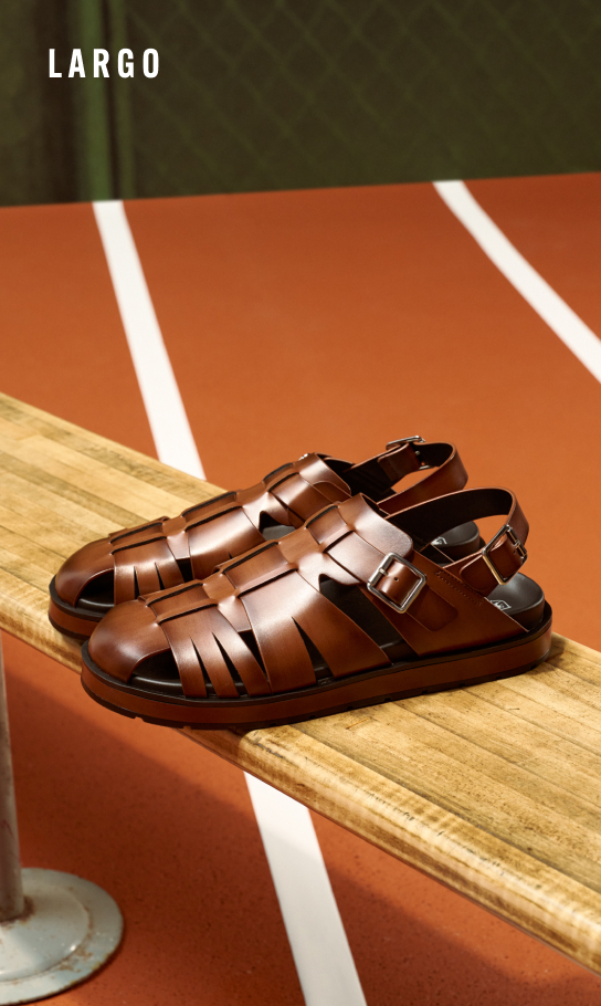 Men's Sandals Category. Image features the Largo sandal in cognac on a bench. 