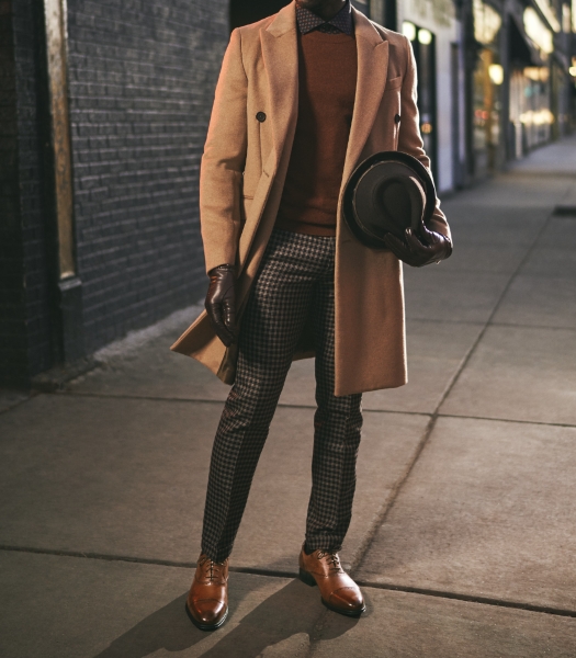 The featured image is a model wearing a business casual outfit and dress shoes at dusk.