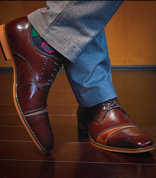 The featured image is a close up of a model wearing brown dress shoes.