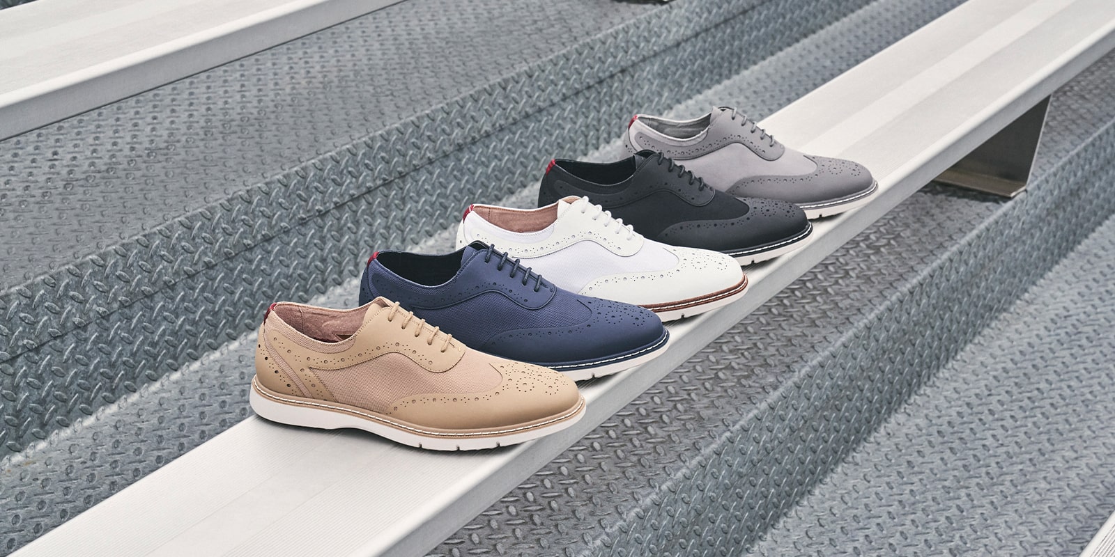 The featured products are the Summit Wingtip Lace Up in Khaki, Navy, White, Black, and Gray.