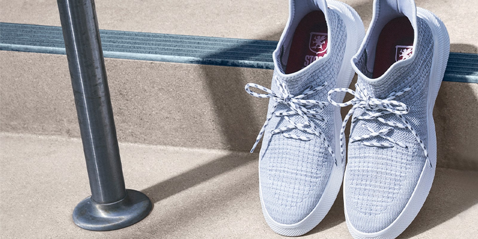 The featured product is the Vortex Knit Lace Up Sneaker in White.