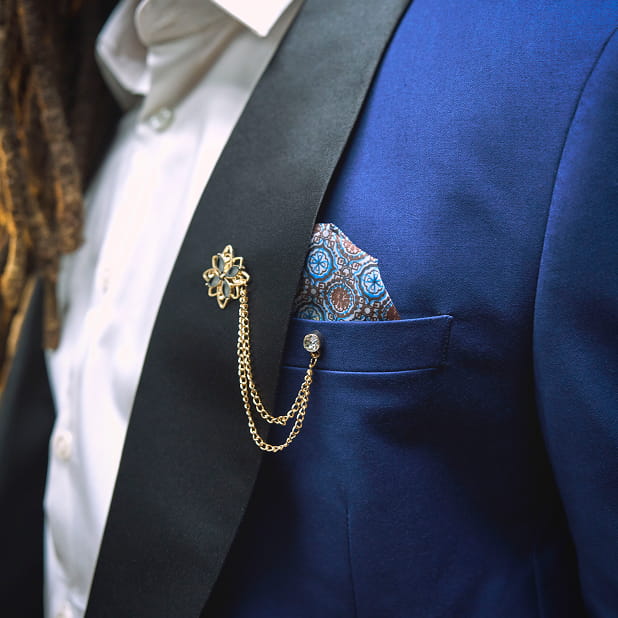"When Wearing A Tuxedo, Make Sure Your Black Tie Attire Shines." The featured image shows a close-up of a model wearing the Stacy Adams Calloway 3 Piece Vested Tux in Indigo.