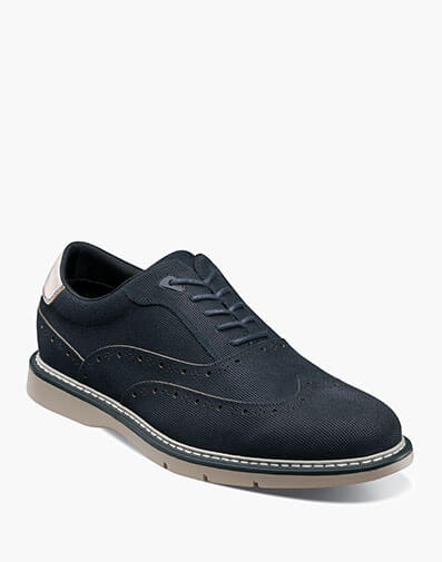 Swift Wingtip Lace Up in Navy Suede.  